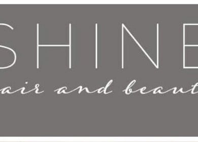 Ryan Joseph beauty sign reading 'Shine Hair and Beauty' in Borrowash, England, GB.