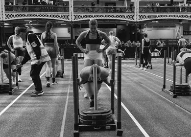 Athletes at Megan Woods Personal Training, Whaley Bridge, GB, competing in an indoor fitness event.