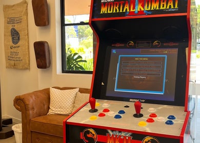 Mortal Kombat arcade at Piccante Barbers, Peregian Springs, Queensland, AU lounge area.