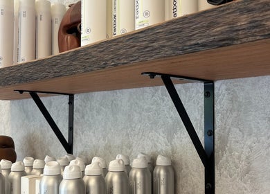 Stylish shelf with hair products at Piccante Barbers in Peregian Springs, Queensland, AU.