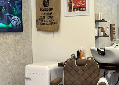 Chic barber shop interior at Piccante Barbers, Peregian Springs, Queensland, AU with sleek salon design.