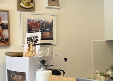 Artistic corner at Piccante Barbers, Peregian Springs, Queensland featuring retro Vespa art.