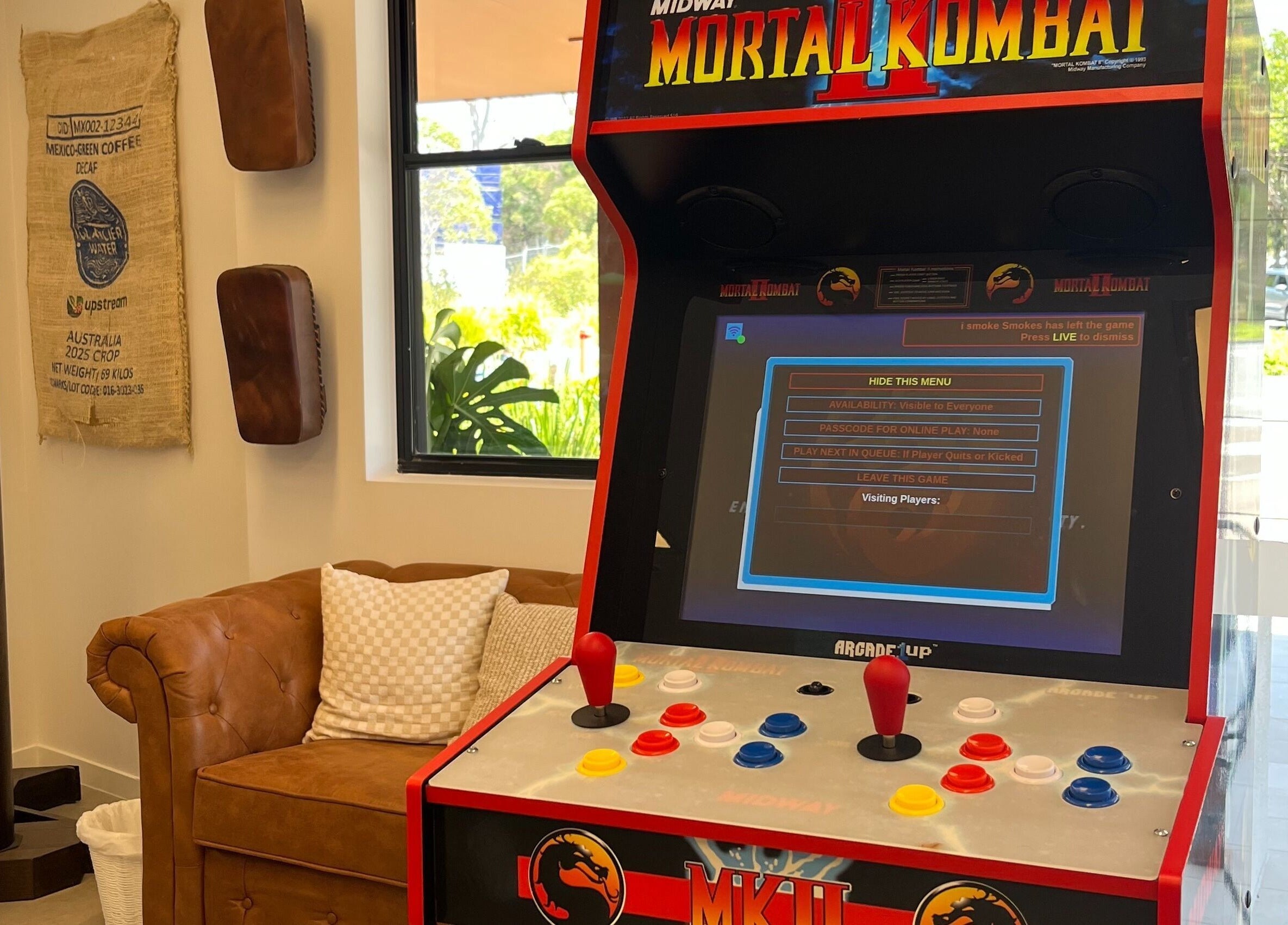 Arcade machine at Piccante Barbers in Peregian Springs, Queensland, AU, offering a unique gaming experience.
