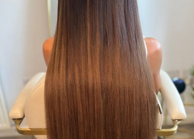 Long, silky hair styled beautifully at The Dolls Lounge, Leeds, England, GB.