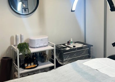 Treatment room at Forever Grace Cosmetic Studio in Pegasus, Canterbury Region, NZ, featuring a cozy, professional setup.