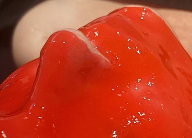 Close-up of vibrant red treatment at Forever Grace Cosmetic Studio, Pegasus, Canterbury Region, NZ.
