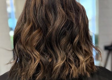 Stylish wavy haircut at LaNora Hair Studio in Crawley, England, GB.