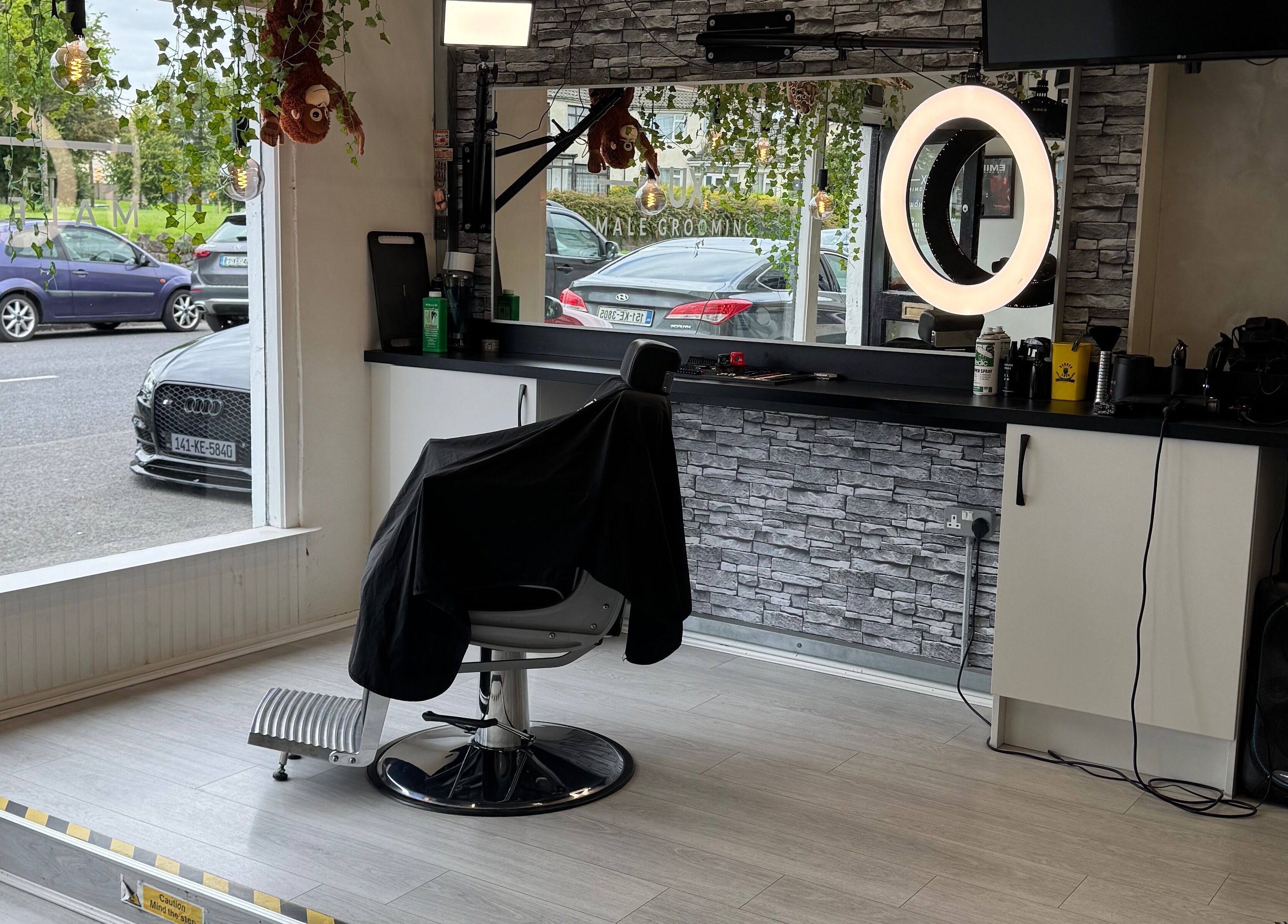 LuxMaleGrooming interior in Kildare, County Kildare, IE showing stylish barber chair and modern decor.