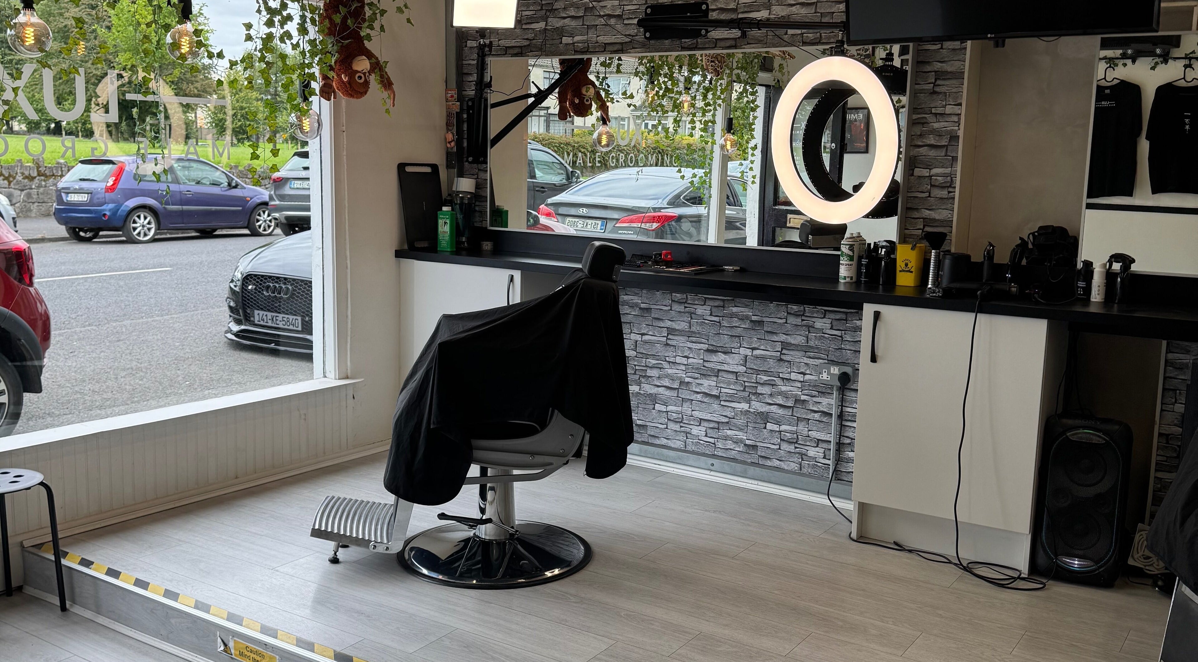 LuxMaleGrooming interior in Kildare, County Kildare, IE showing stylish barber chair and modern decor.