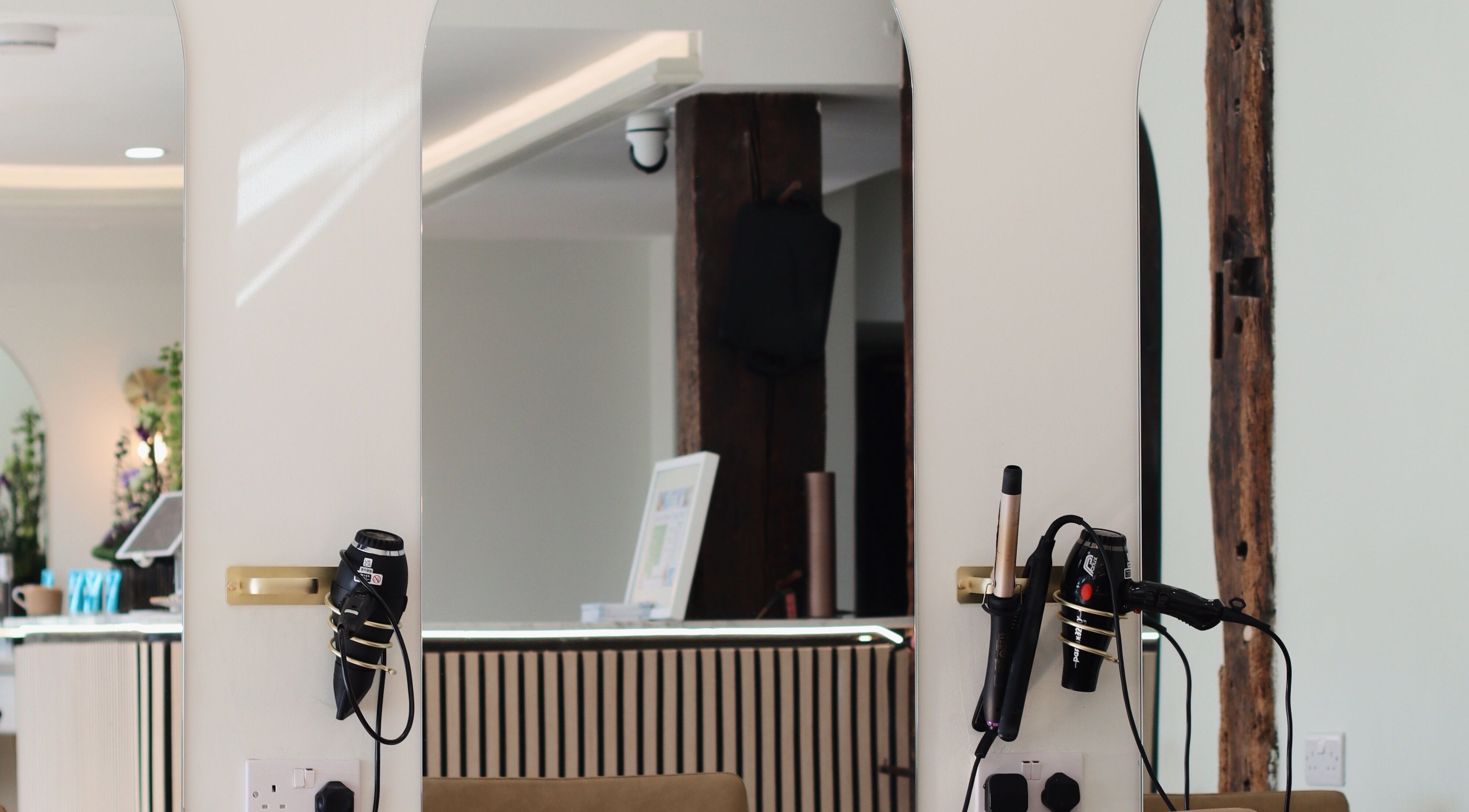 Elegant hair styling station at Blow Garden, West Malling, England, GB, featuring modern tools and mirrors.