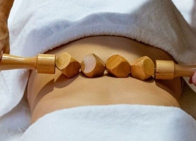 Wooden massage roller used at Tranquility Touch, Hamilton, Scotland, GB for a soothing treatment.