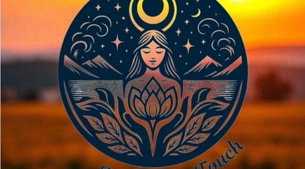 Intricate emblem featuring serene woman, crescent moon, and lotus at Tranquility Touch, Hamilton, Scotland, GB.