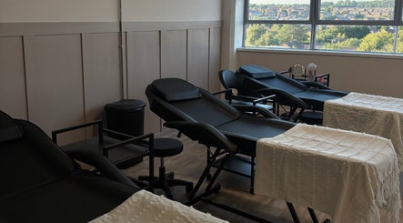 Comfortable massage beds at Studio S By Sienna, Stoke-on-Trent, England, GB offer a tranquil spa setting.
