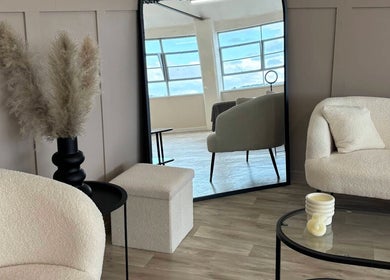 Chic interior of Studio S By Sienna, Stoke-on-Trent, England, featuring modern seating and decor.