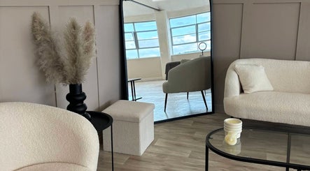 Chic interior of Studio S By Sienna, Stoke-on-Trent, England, featuring modern seating and decor.