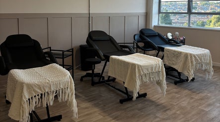 Comfortable massage chairs in Studio S By Sienna at Stoke-on-Trent, England, GB with a scenic view.