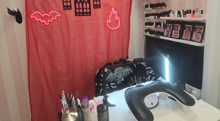 Cozy nail station at The Nail Angel in Bingley, England, GB adorned with vibrant decor and nail polish.