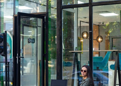 Stylish seating outside 3rd Generation London, Timișoara, Județul Timiș, RO, showcasing an inviting entrance.