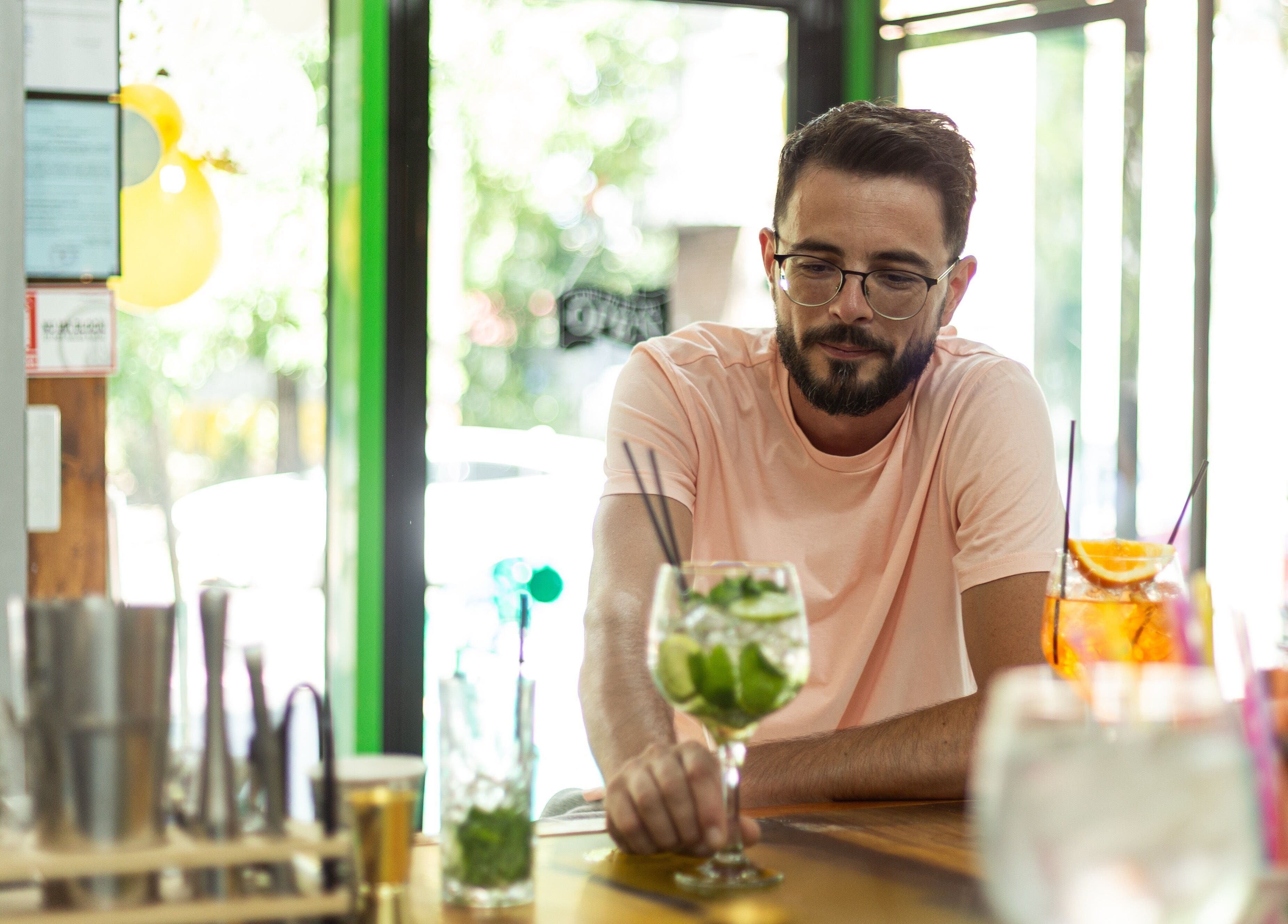 Man at 3rd Generation London enjoying a refreshing drink in Timișoara, Județul Timiș, RO.