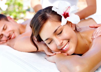 Couple enjoying a relaxing massage at AMATA MASSAGE STUDIO, Toronto, Ontario, CA, enhancing wellness.