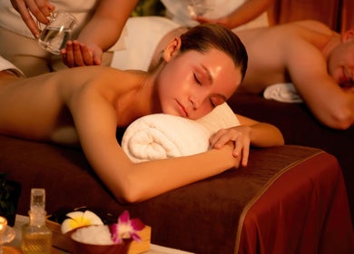 Couple enjoying massages at AMATA MASSAGE STUDIO, Toronto, Ontario, CA in a tranquil setting.