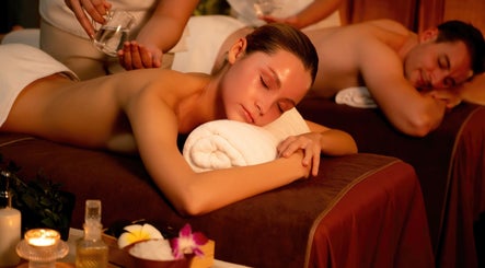 Couple enjoying massages at AMATA MASSAGE STUDIO, Toronto, Ontario, CA in a tranquil setting.