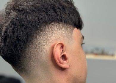 Close-up of a stylish fade haircut at DEEP HAIR premium cut & shave, Romano Di Lombardia, Lombardia, IT.