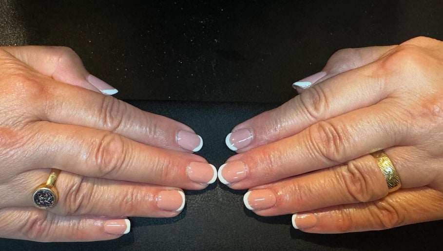Elegant French manicure at LT Hair And Beauty, Bideford, England, GB showcasing professional nail artistry.