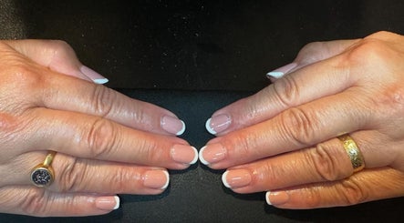 Elegant French manicure at LT Hair And Beauty, Bideford, England, GB showcasing professional nail artistry.