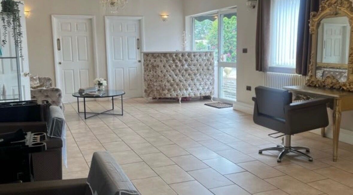 Stylish interior of Natalia's Hairistry in Frampton Cotterell, England, GB featuring chic furnishings.