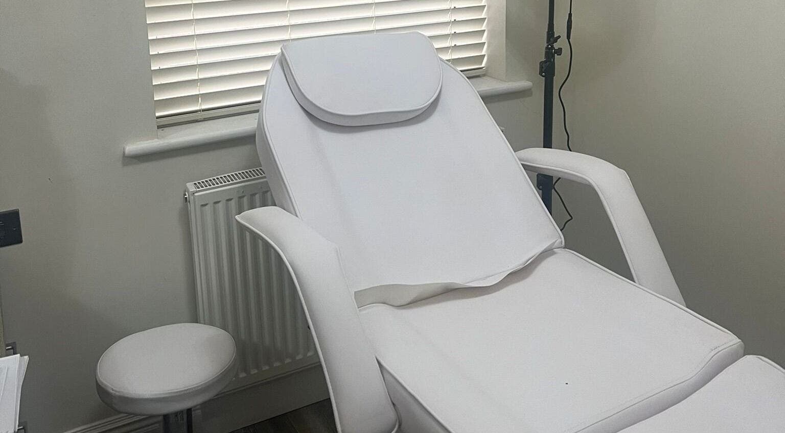 Elegant treatment chair at Bio Aesthetics Studio, Uxbridge, UB8 3AY, England, GB for relaxing beauty services.