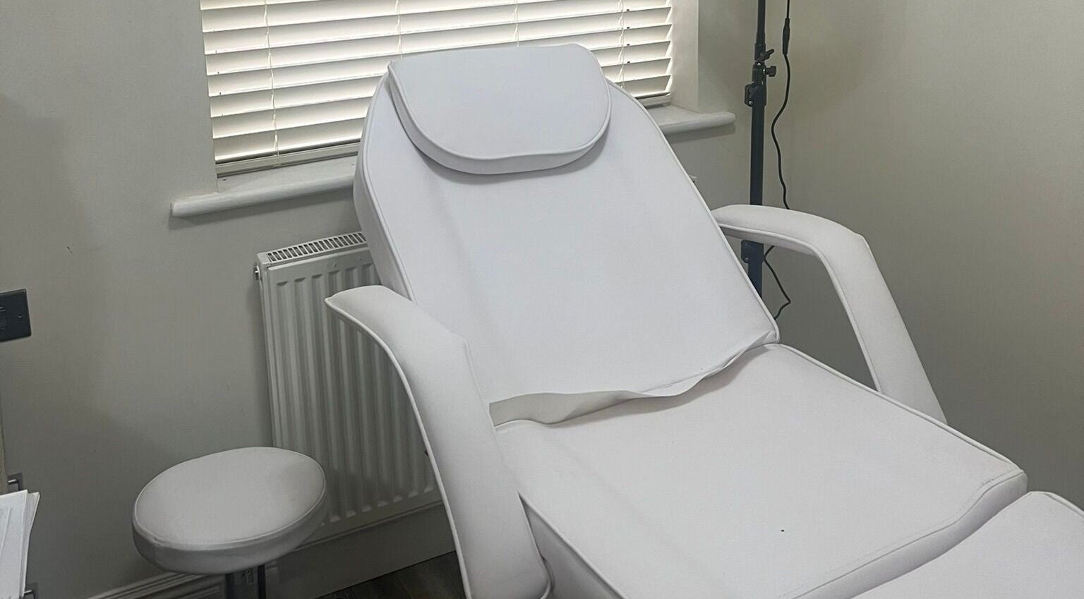 Elegant treatment chair at Bio Aesthetics Studio, Uxbridge, UB8 3AY, England, GB for relaxing beauty services.