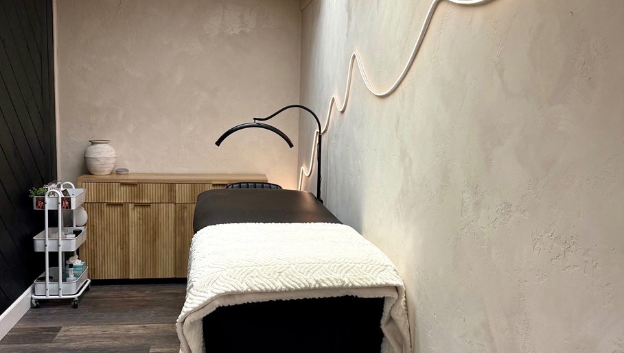 Elegant treatment room at Bloom Lash & Esthetics, Pocatello, Idaho, US. Cozy bed with soothing decor.