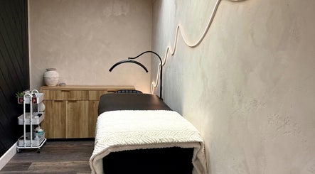 Elegant treatment room at Bloom Lash & Esthetics, Pocatello, Idaho, US. Cozy bed with soothing decor.