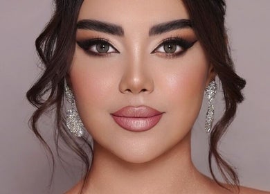Elegant makeup look from Make Up by Niloo featuring bold eyes and nude lips, London, GB.
