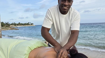 Relaxing beach massage at Body Delight Curacao in Willemstad, CW, showcasing serene ocean view and expert care.