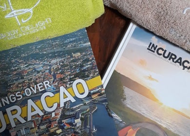 Body Delight Curacao in Willemstad, CW features local guides and branded towels.