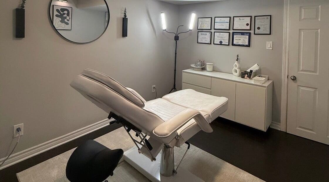 Elegant treatment room at RayanBeautyy - Ottawa, featuring a plush chair and decor. Located in Ottawa, Ontario, CA.