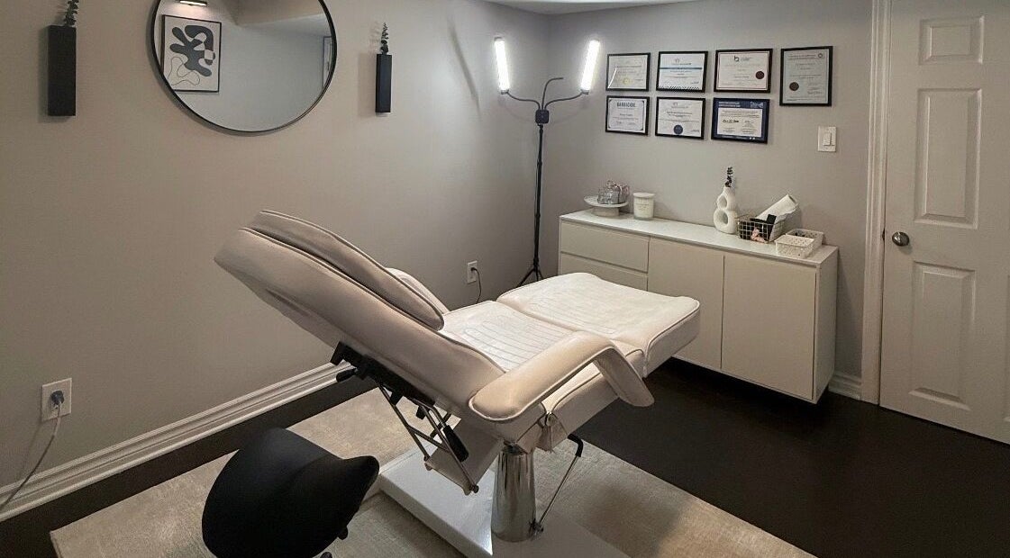 Elegant treatment room at RayanBeautyy - Ottawa, featuring a plush chair and decor. Located in Ottawa, Ontario, CA.