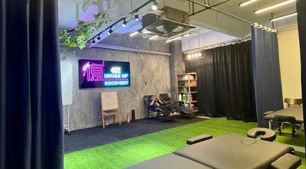 Relaxing lounge at FU HOUSE RECOVERY, Kuala Lumpur, MY with massage chairs and welcoming decor.