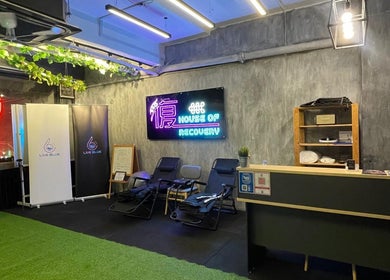 FU HOUSE RECOVERY reception in Kuala Lumpur features cozy chairs and vibrant decor for wellness seekers.