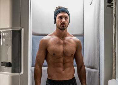 Man in cryotherapy chamber at Cryo Stay Young Eastland, Melbourne, Victoria, AU for rejuvenation.
