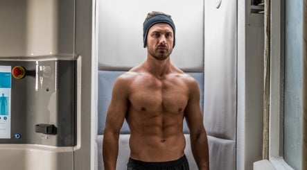 Man in cryotherapy chamber at Cryo Stay Young Eastland, Melbourne, Victoria, AU for rejuvenation.