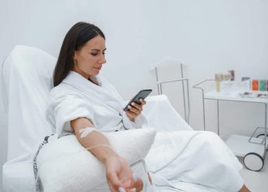 Woman enjoying IV therapy at Infuse Performance, Melbourne, Victoria, AU.