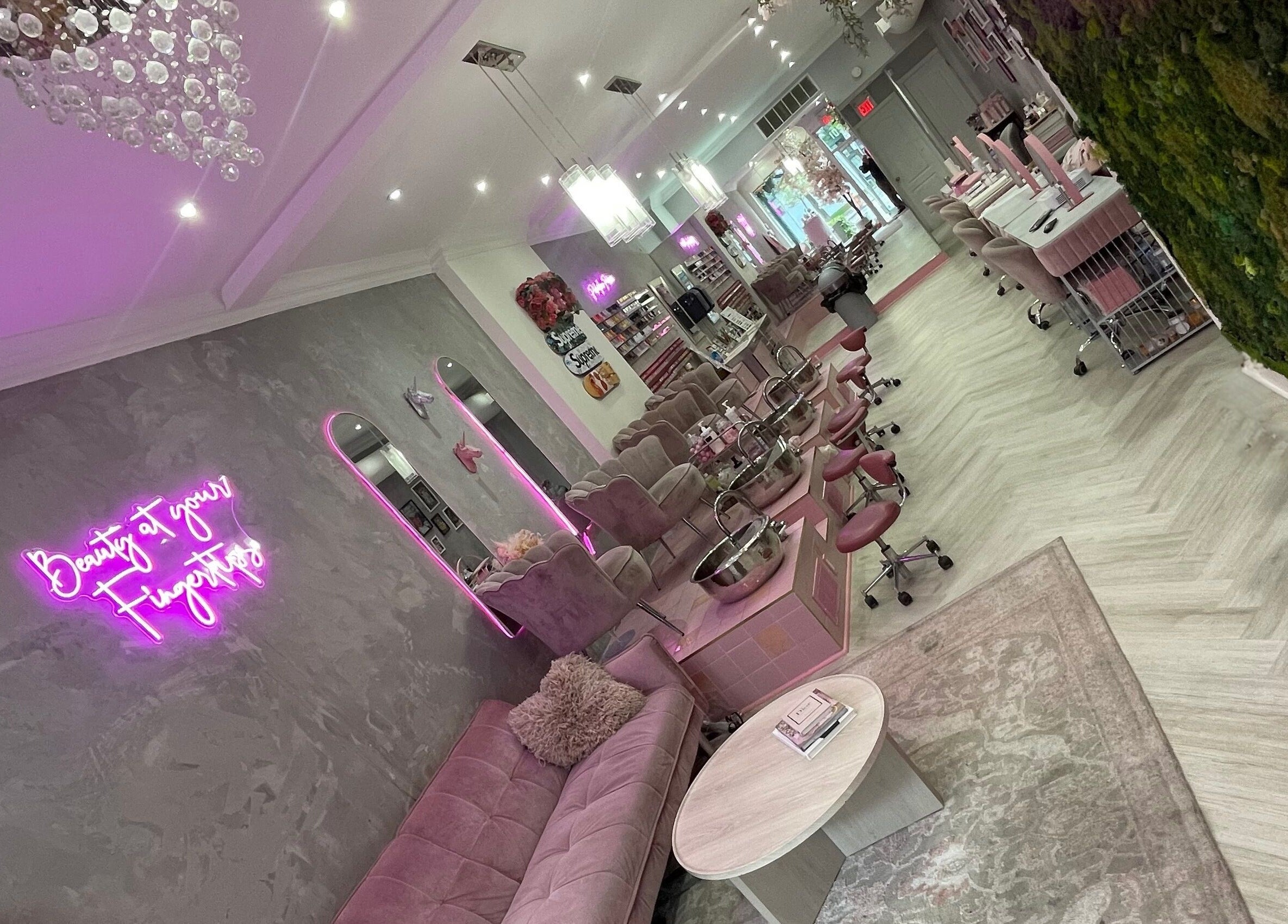 Elegant Top Coat salon in Toronto, Ontario, CA featuring plush seating and vibrant decor for beauty services.