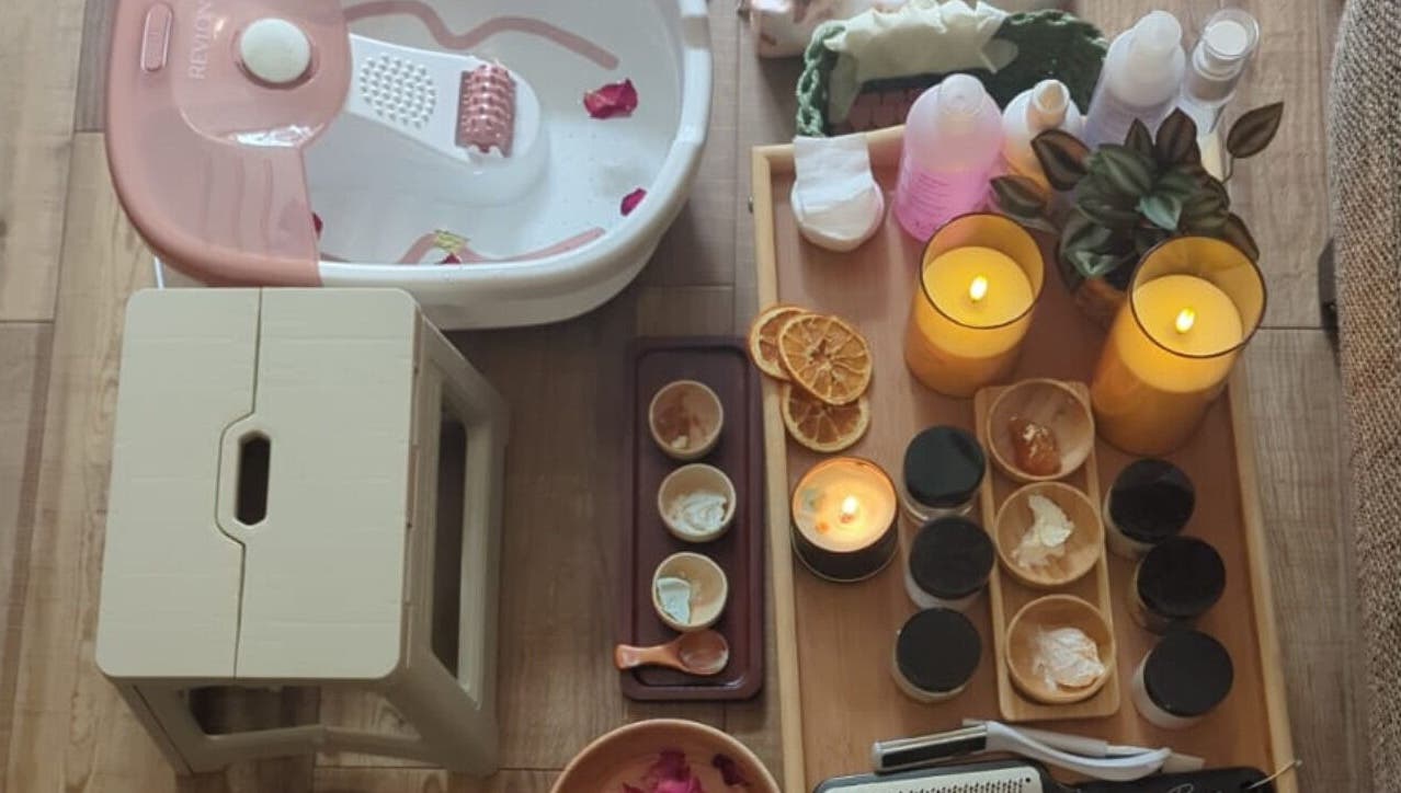Foot bath and candles at Fusion Spa & Salon UK, Slough, England, GB enhancing relaxation ambiance.