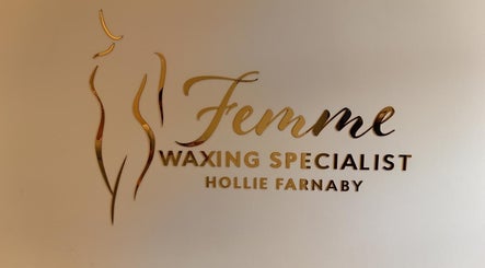 Golden Femme Waxing Specialist Hollie Farnaby logo displayed on a wall in Leeds, England, GB.