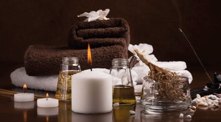 Tranquil spa setup with candles and oils at Beautiful Flower, Riyadh, Riyadh Province, SA.