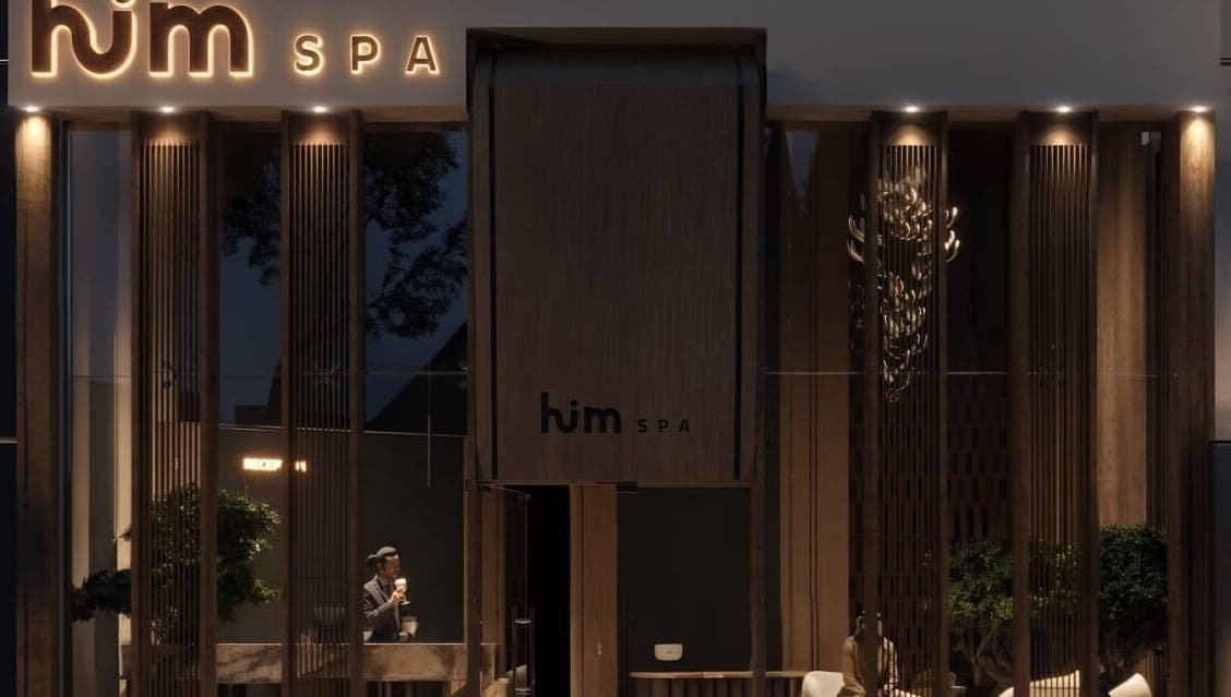 Entrance of Him Spa in Riyadh, Riyadh Province, SA, showcasing modern decor and ambient lighting.