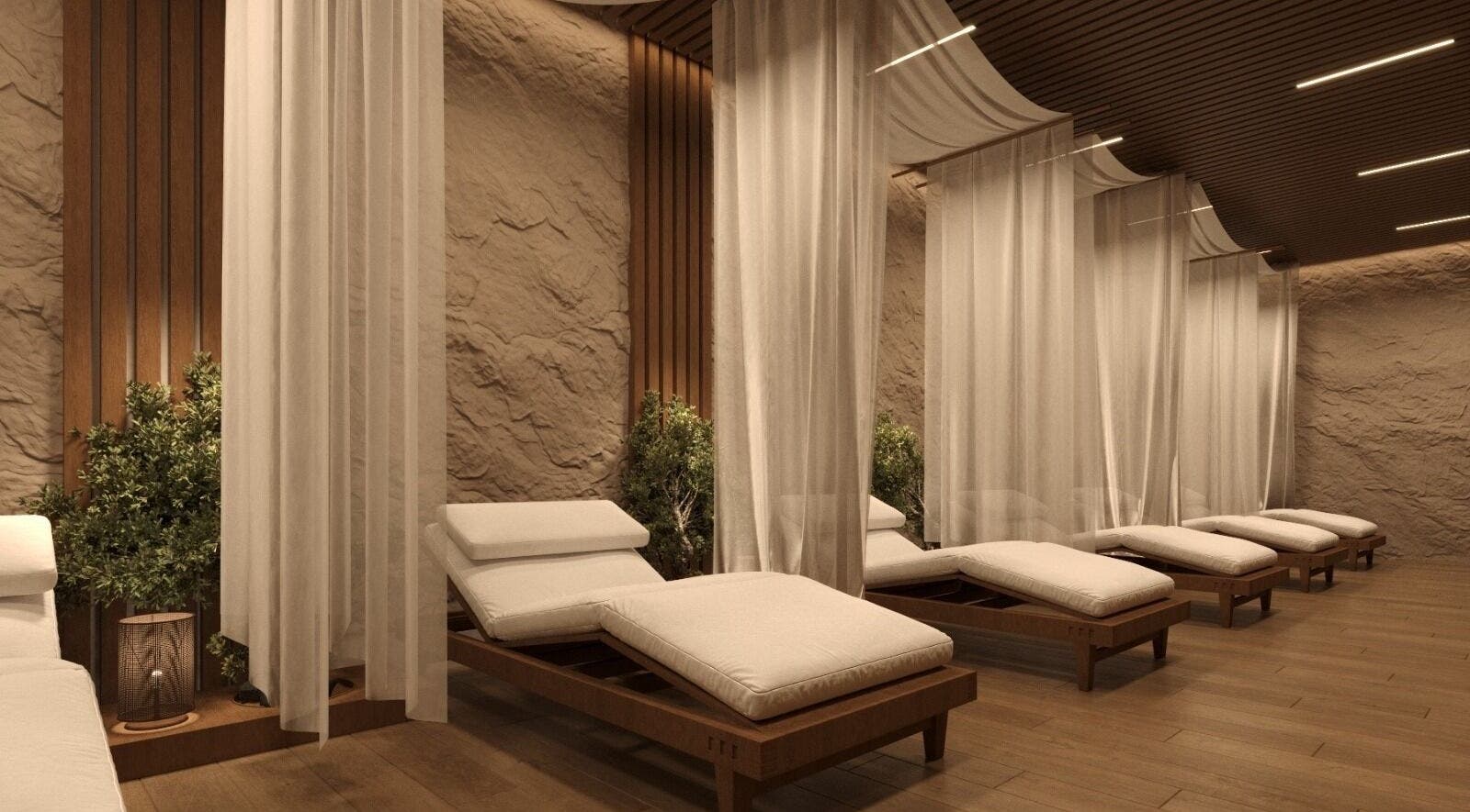 Luxurious relaxation room at Him Spa, Riyadh, Riyadh Province, SA with elegant loungers and soft lighting.